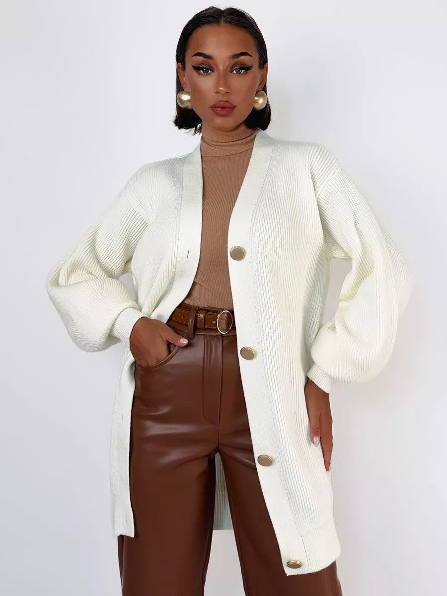 Kvinders strikket frakke med oversized snit og elegante knapdetaljer Stilla
