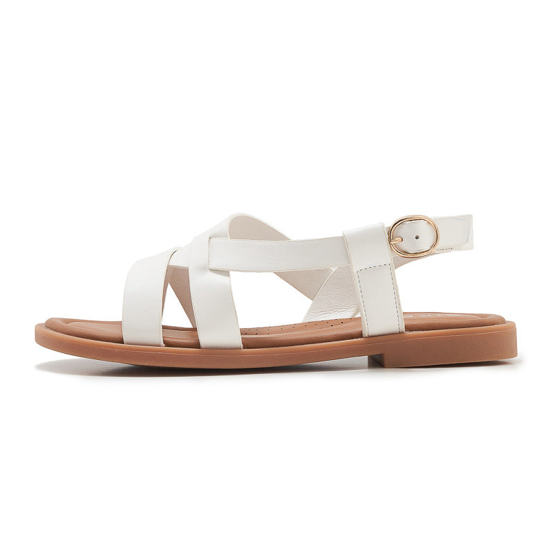 Dame sandaler med elegant krydsrem og justerbar hælrem Stilla