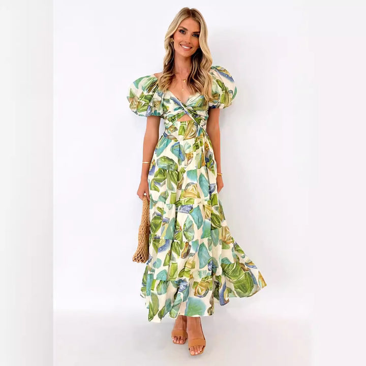 Dame maxikjole med voluminøse puffærmer og blomstret design Stilla