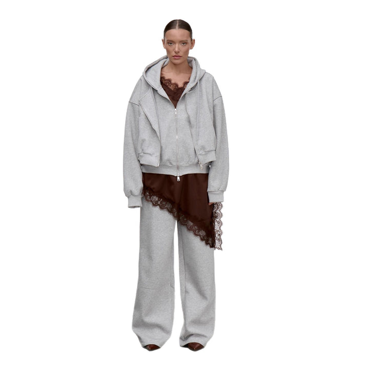 Damernes oversized hoodiejakke med generøse lommer og stilfuldt design Stilla