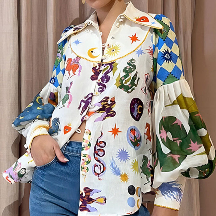 Stilla | Elegant Bluse Med En Legesyg Print Til Kvinder