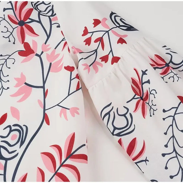 Stilla | Elegant Strikjakke Med Etno Blomstertryk