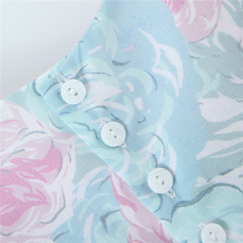 Stilla | Bluse Med Pastelfarvet Blomsterdesign og Puffærmer