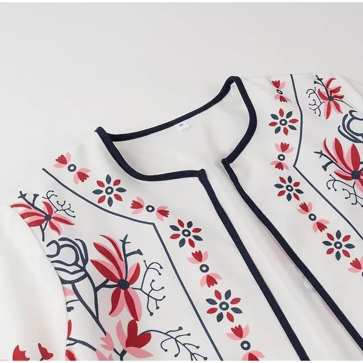 Stilla | Elegant Strikjakke Med Etno Blomstertryk
