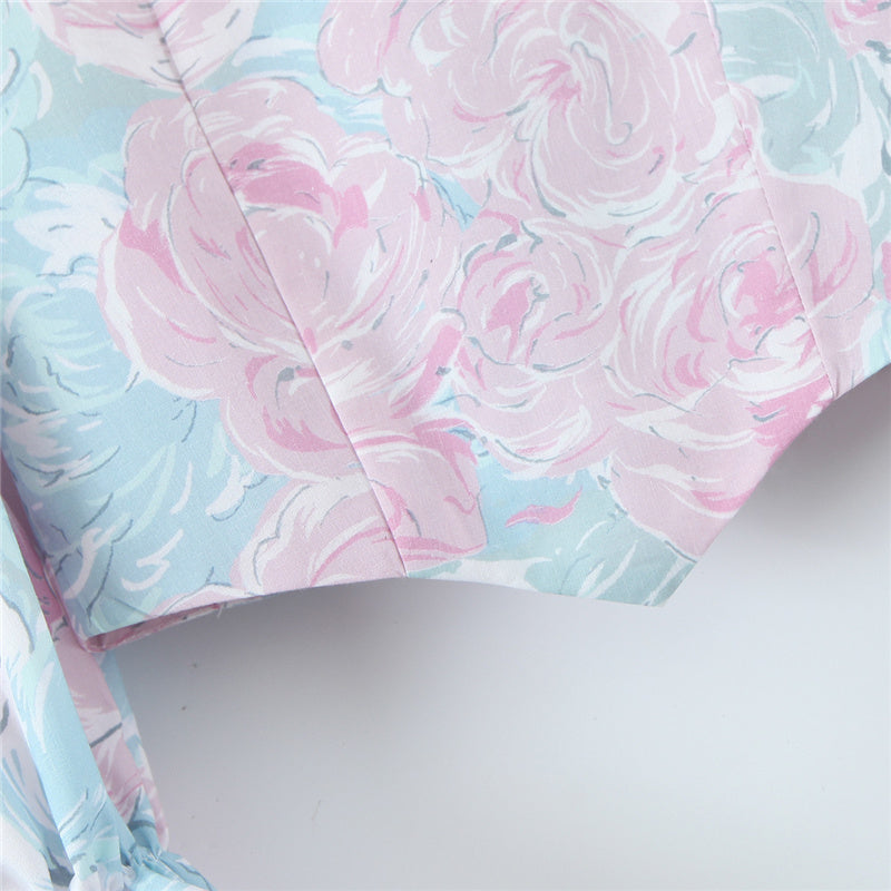 Stilla | Bluse Med Pastelfarvet Blomsterdesign og Puffærmer