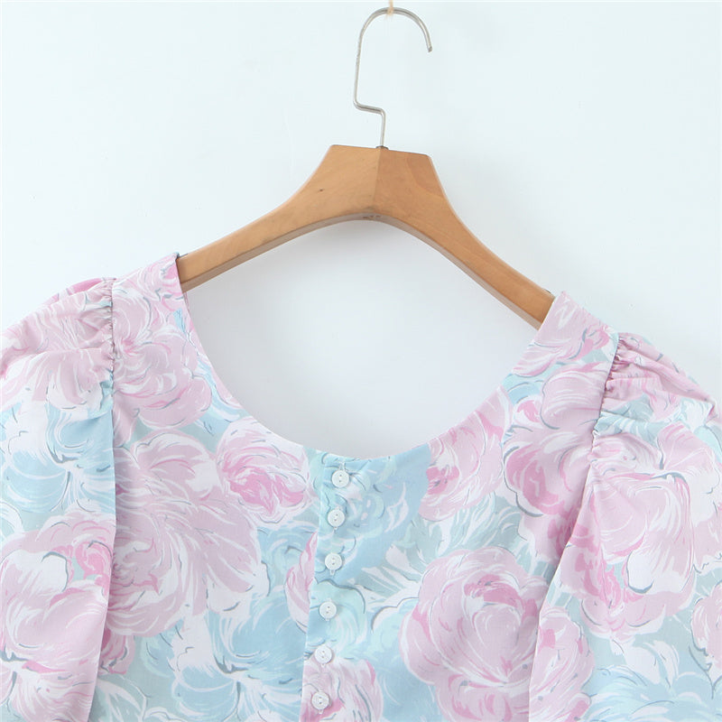 Stilla | Bluse Med Pastelfarvet Blomsterdesign og Puffærmer
