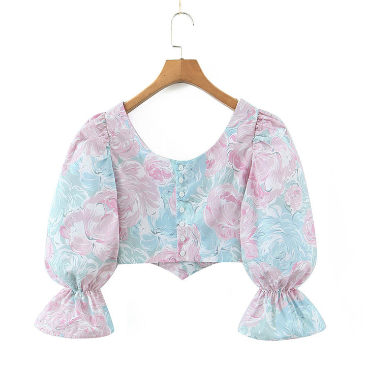 Stilla | Bluse Med Pastelfarvet Blomsterdesign og Puffærmer
