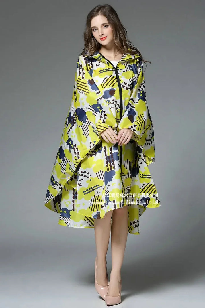 Stilla | Poncho med geometrisk grafiktryk