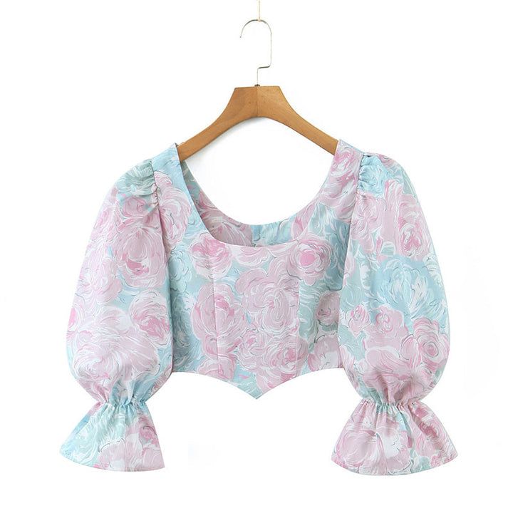 Stilla | Bluse Med Pastelfarvet Blomsterdesign og Puffærmer