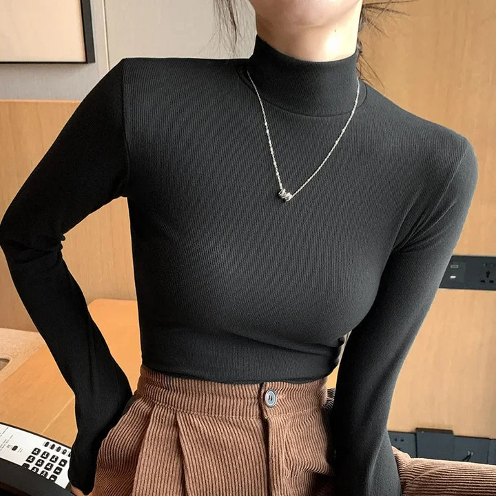 Stilla | Rullekrave sweater med leopardmønster
