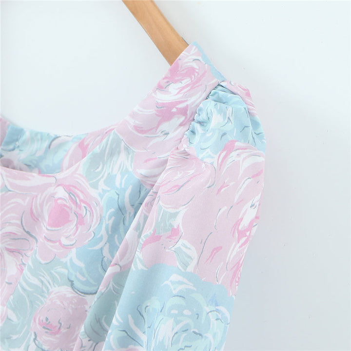 Stilla | Bluse Med Pastelfarvet Blomsterdesign og Puffærmer