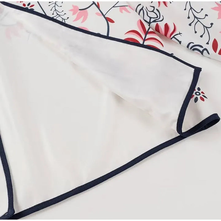 Stilla | Elegant Strikjakke Med Etno Blomstertryk
