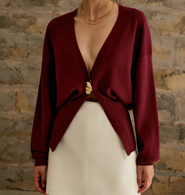 Stilla | Elegant strikpullover til damer med ensfarvet knaplukning