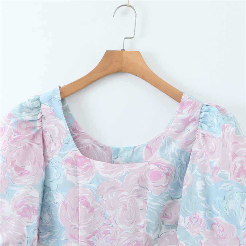 Stilla | Bluse Med Pastelfarvet Blomsterdesign og Puffærmer