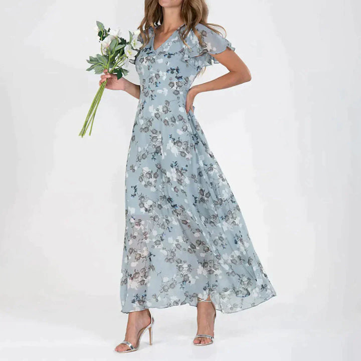 Stilla | Elegant blomsterkjole til festlige begivenheder