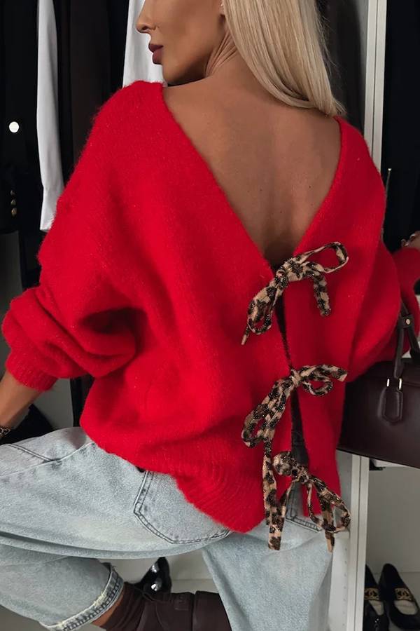 Stilla | Strikpullover med trendy kvaster, leopardmønster og bindebånd