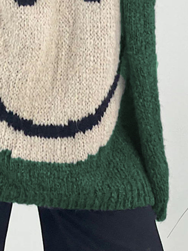 Stilla | Pullover med lange ærmer med et smilende ansigt og V-udskæring