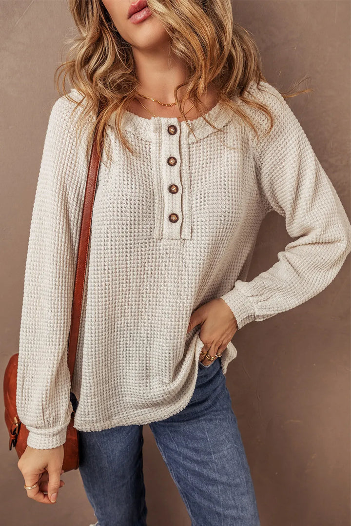 Stilla | Pullover med kort krave lavet af struktureret strik med halve knapper