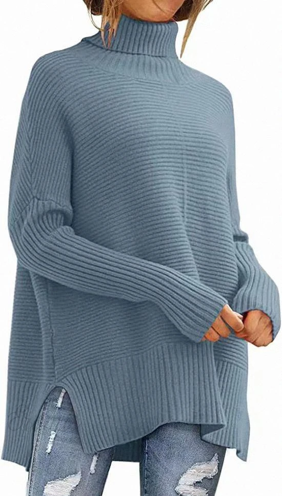 Stilla | Modern blå slids-Turtleneck-strikpullover med flagermusærmer Ideel til vinteren