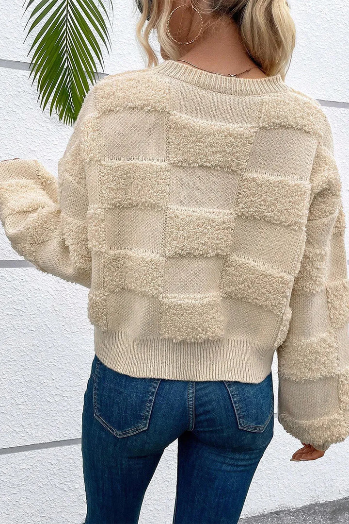 Stilla | Ternet sweater med rund halsudskæring og overskårne skuldre