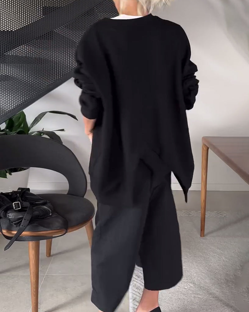 Stilla | Sweatshirt med rund halsudskæring og slids i ensfarvet