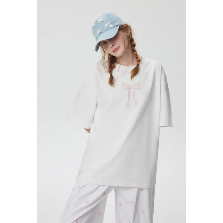 Stilla | T-Shirt Oversize med broderet knude