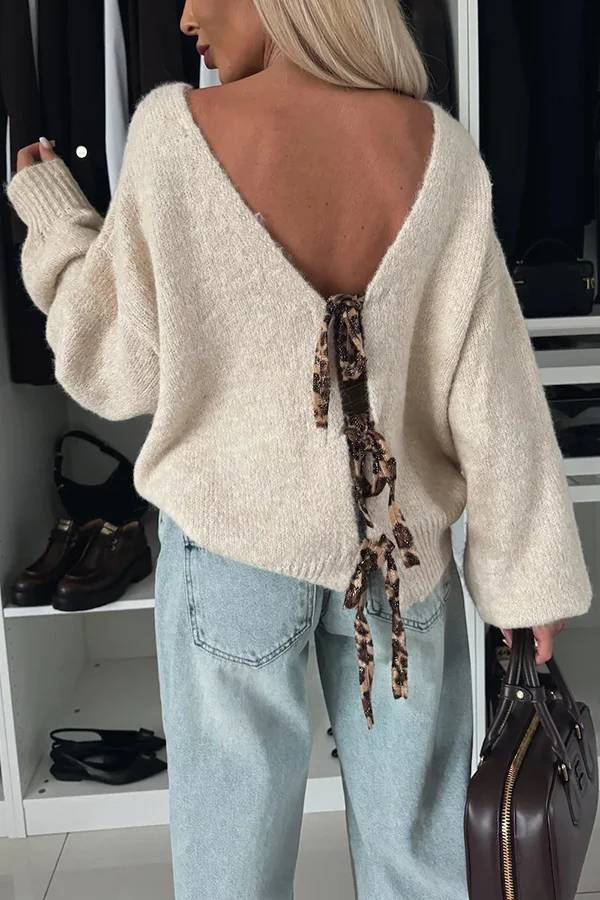 Stilla | Strikpullover med trendy kvaster, leopardmønster og bindebånd