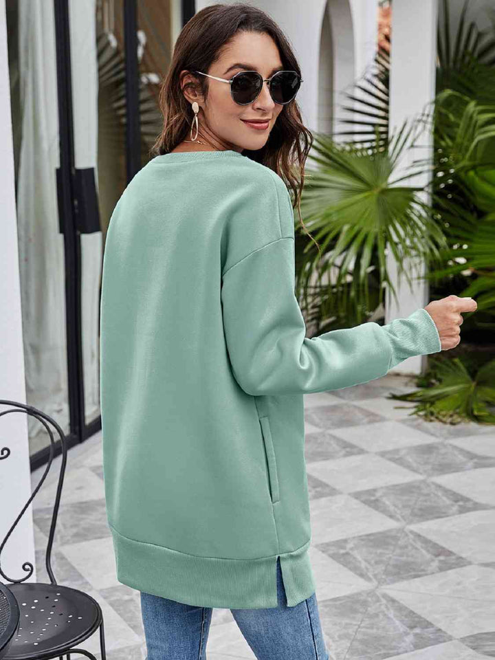Stilla | Stop Believing Graphic Drop Shoulder Sweatshirt