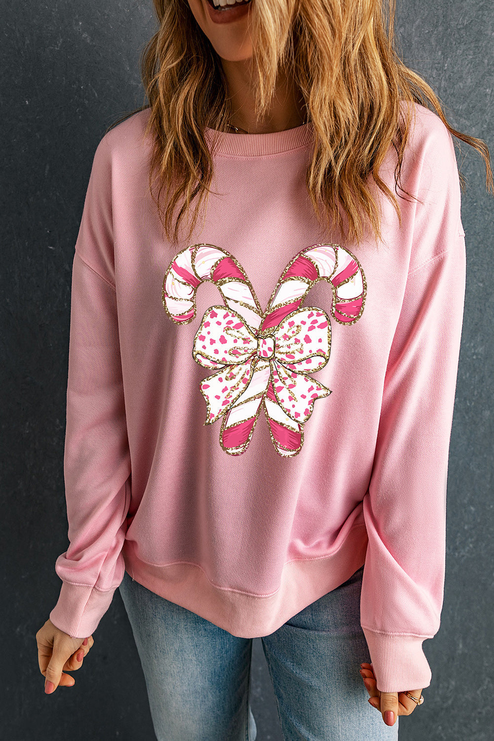 Stilla | Sweatshirt med nedfaldende skuldre og julegrafik samt roser sløjfe