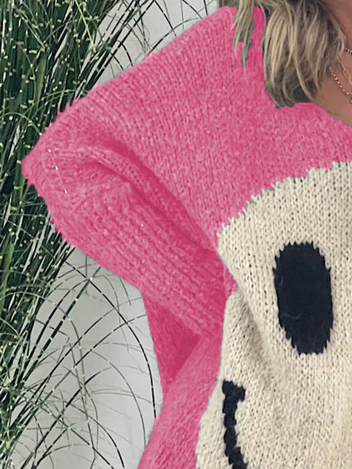 Stilla | Pullover med lange ærmer med et smilende ansigt og V-udskæring