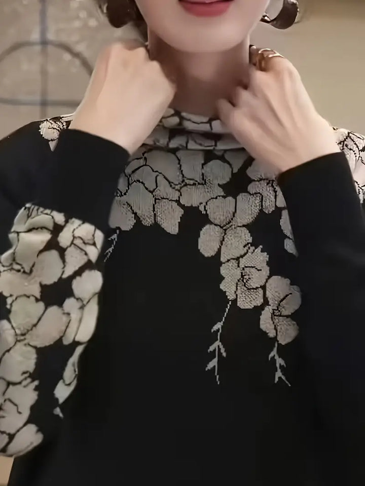 Stilla | Elegant strikpullover med rullekrave og blomstertryk