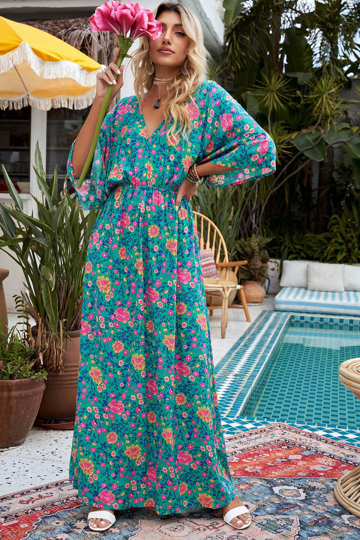 Stilla | Lang Boho Grøn Kjole Med Dyb V-hals og Blomstermønster