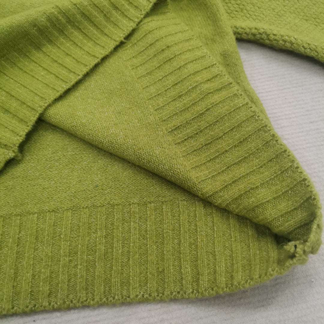 Stilla | Overdimensioneret strikket rullekravepullover i græsgrøn