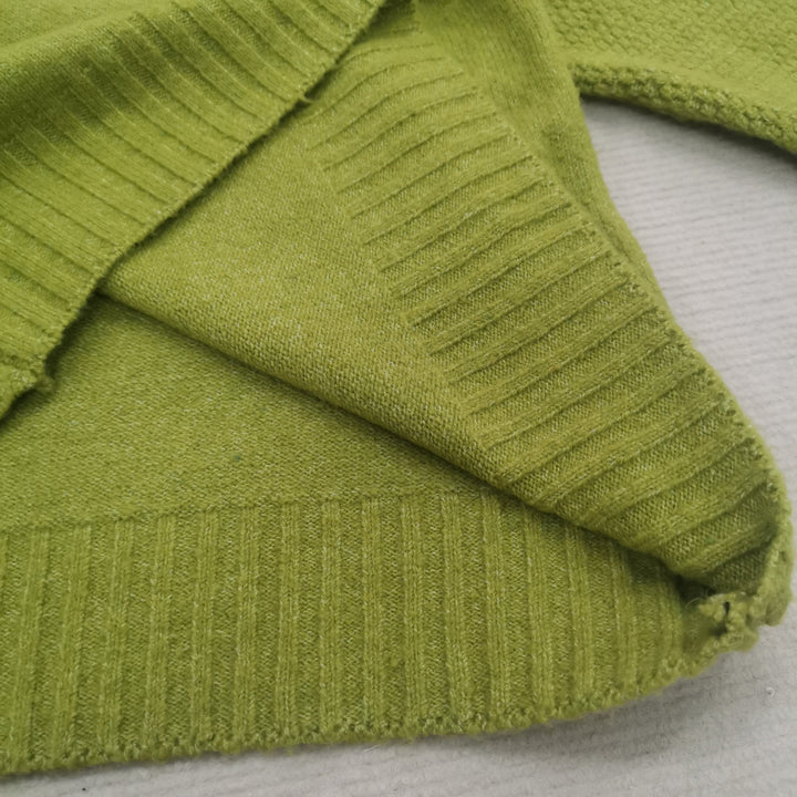 Stilla | Overdimensioneret strikket rullekravepullover i græsgrøn