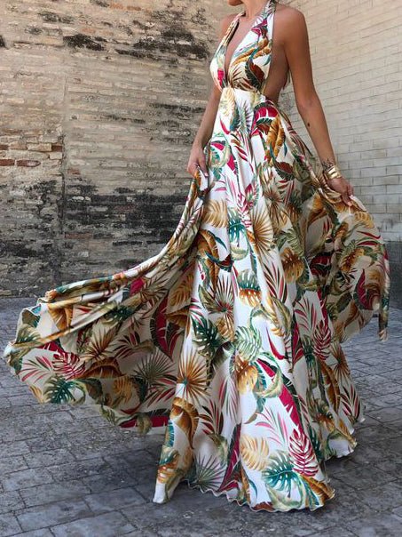 Stilla | Ærmeløs Kjole med Halterneck Print og Åben Ryg